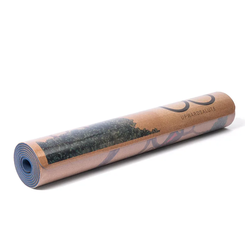 Rolled-up yoga mat with natural material texture on a white background